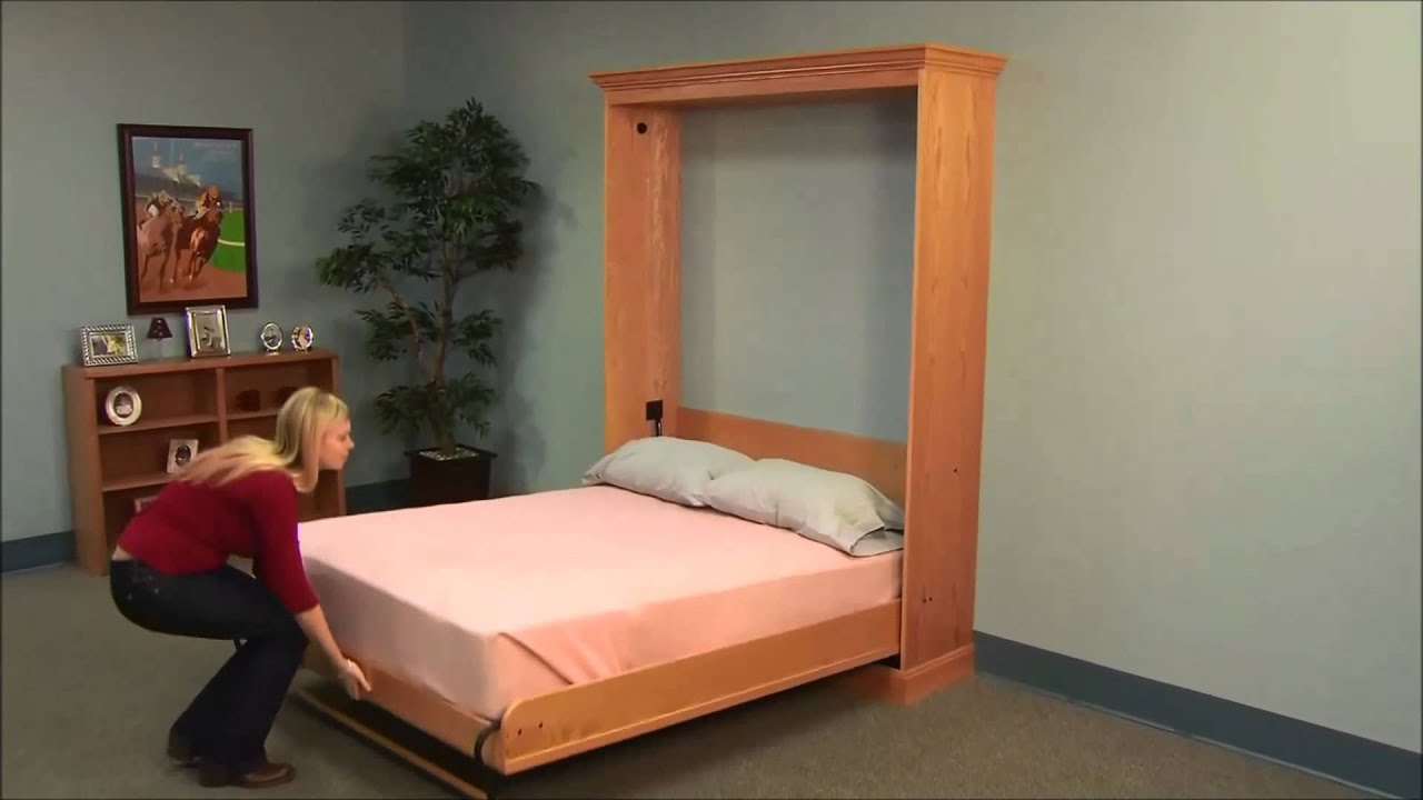 cama pegada pared