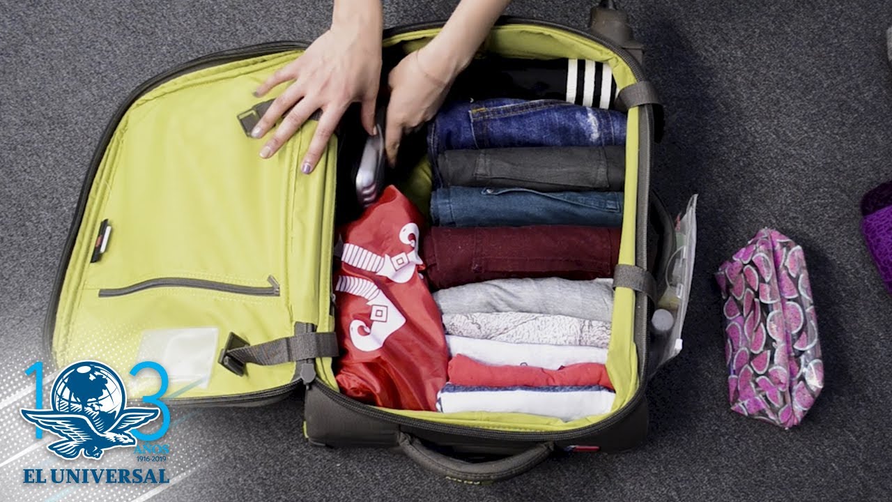 como doblar ropa para ahorrar espacio en la maleta