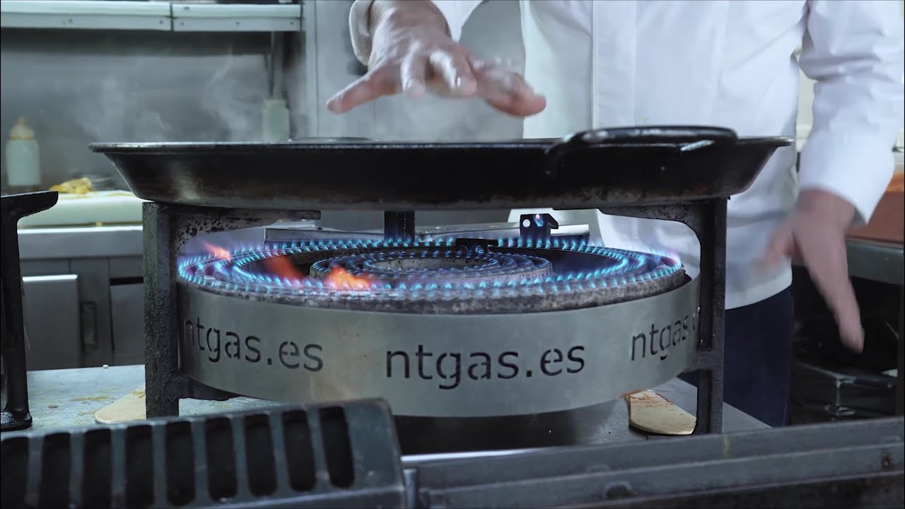 porque se tapa la paella con un paño